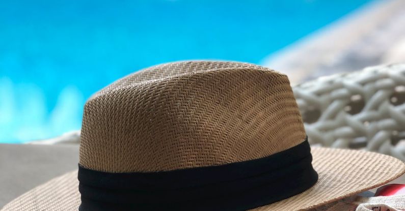 Hat - Beige And Black Hat Near Swimming Pool